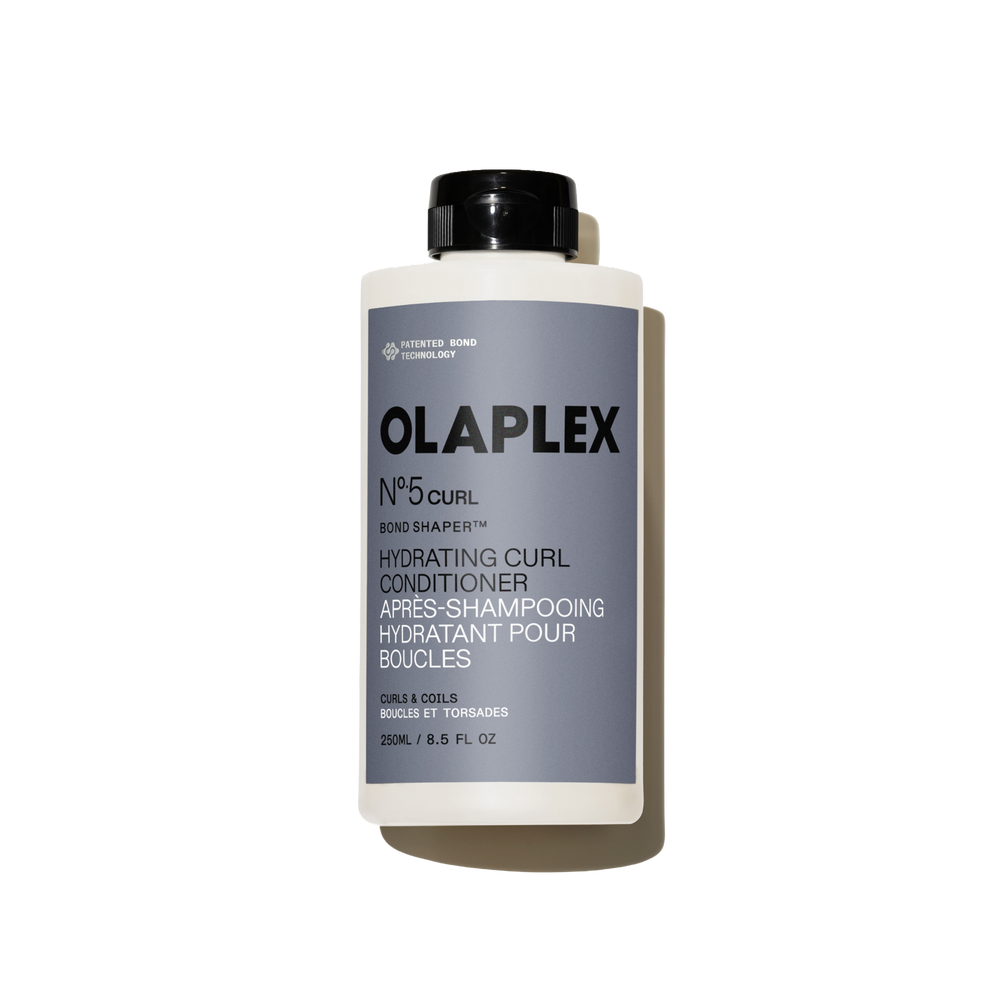 hover 

A thick, creamy white swatch of OLAPLEX Nº.5CURL Hydrating Curl Conditioner showing a smooth, rich texture on a light gray background. - alternate view