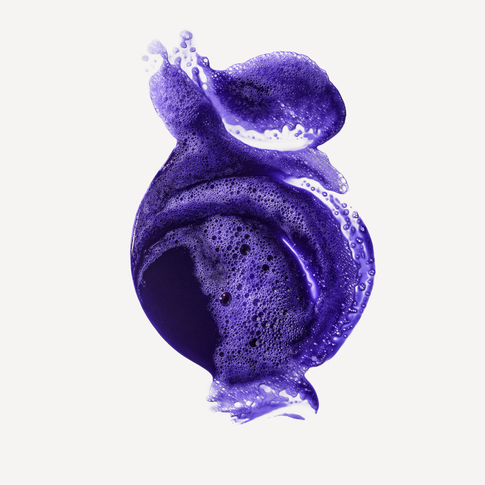 hover

A textured, abstract splash of vibrant purple toning shampoo showing rich lather and fine bubbles, centered against a clean white background. - alternate view