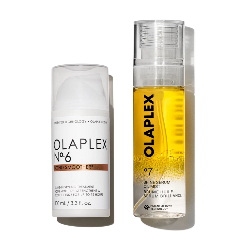 Two Olaplex hair products stand side by side against a clean white background. On the left is Olaplex No.6 Bond Smoother, a white pump bottle with a clear cap. On the right is a slightly taller bottle of Olaplex No.7 Shine Serum Oil Mist, a clear spray bottle showing a vibrant golden-yellow liquid inside. Both bottles feature the brand's classic minimalist design with clean black lettering. - main view