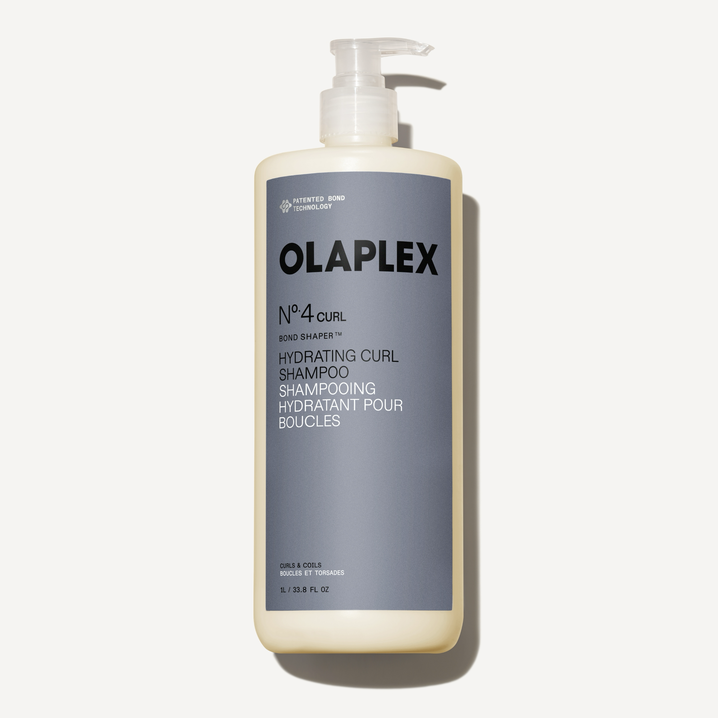 Olaplex Nº.4CURL Bond Shaper Hydrating Curl Shampoo 1000ml bottle on a plain white background.