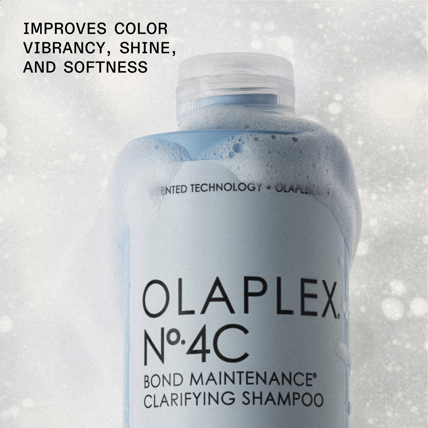 IMPROVES COLOR VIBRANCY, SHINE, AND SOFTNESS

OLAPLEX Nº.4C BOND MAINTENANCE® CLARIFYING SHAMPOO on white background
