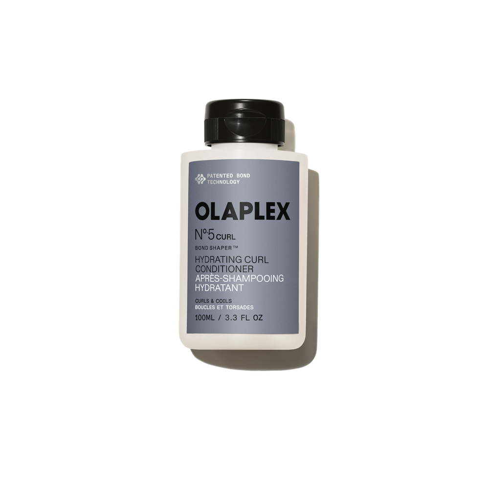 hover 

A thick, creamy white swatch of OLAPLEX Nº.5CURL Hydrating Curl Conditioner showing a smooth, rich texture on a light gray background. - alternate view